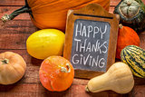 Happy Thanksgiving on blackboard with squash