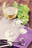 White wine glass and grapes