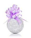 Christmas bauble and purple ribbon