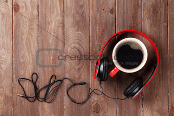 Headphones and coffee cup