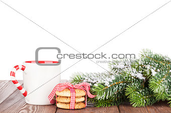 Christmas tree branch, cookies and mulled wine cup