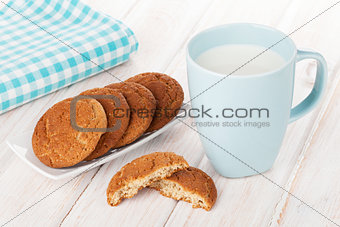 Cup of milk and gingerbread cookies
