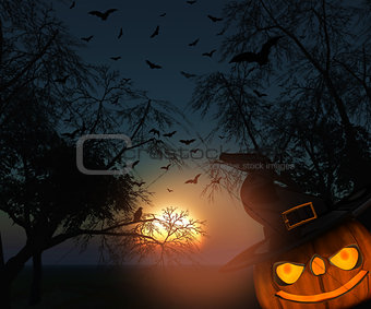 3DHalloween landscape of trees against a sunset sky