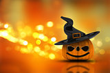 3D Halloween pumpkin on a bokeh lights background