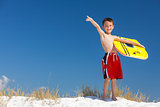 Boy Male Child Pointing on Beach With Surfboard
