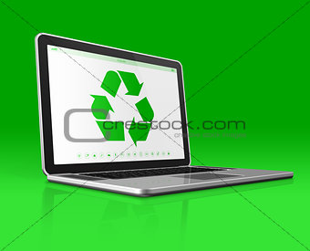 Laptop with a recycling symbol on screen. environmental conserva
