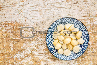 macadamia nuts on ceramic bowl