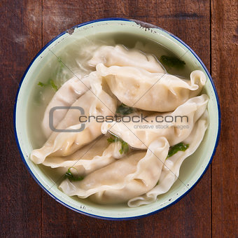 Top view Asian food dumplings soup 