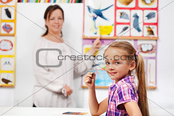 Young girl in elementary science class