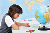 Young boy study geography