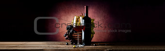 Wine with grape in basket