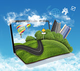 illustration of laptop with meadow, road and skyscrapers.