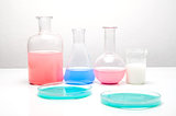Laboratory glassware with liquids of different colors