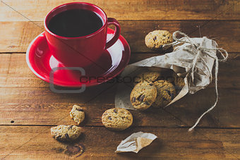cup of coffee and oatmeal cookies. background. toning