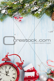 Christmas background with tree, alarm clock and decor