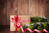 Christmas gift box and tree branch