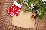 Christmas decor with snow fir tree background and paper