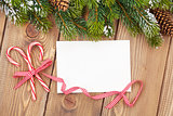 Christmas tree branch and blank greeting card