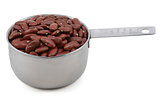 Red kidney beans in a measuring cup