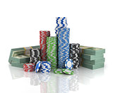 Stacks of poker chips with stack of dollars.