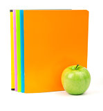 Fresh apple with exercise books