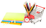 Crayons and alarm clock with shopping cart