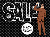 Black Friday businessman writes sale
