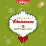 Christmas bauble label on green background