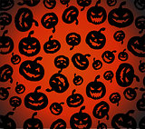 Seamless Halloween pumpkins background 
