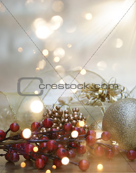 Christmas background with gift and decorations and bokeh lights