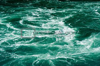 Abstract white water currents in green river
