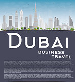 Dubai City skyline with grey skyscrapers, blue sky and copy spac