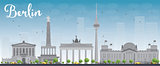 Berlin skyline with grey building and blue sky.