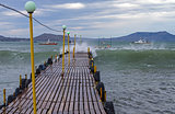 Wave fills a small jetty.