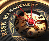Risk Management on Black-Golden Watch Face.