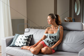 relaxed girl on sofa