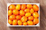 Orange tomatoes box