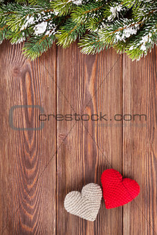 Christmas tree branch with heart toys