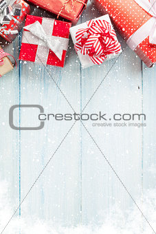 Christmas gift boxes on wooden table