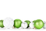 Green and silver christmas baubles