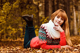 Beautiful young woman - colorful autumn portrait