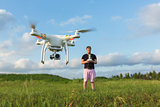 Person with Drone in Field