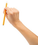 Humans hand holding yellow pencil