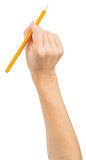 Womans hand holding pencil