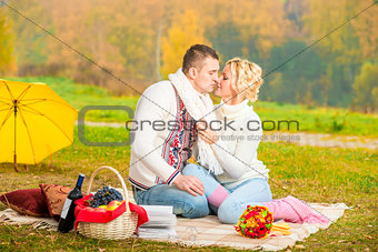 young people spend time on a romantic picnic