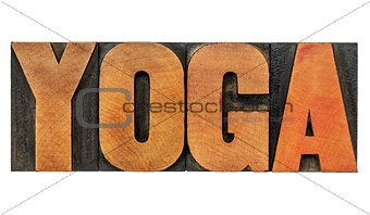 yoga word in wood type
