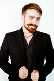 young red hair man with beard and mustache in black suit on white background