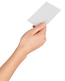 Womans hand giving small blank card