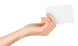 Womans hand offering small empty card