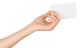 Womans arm offering small empty card